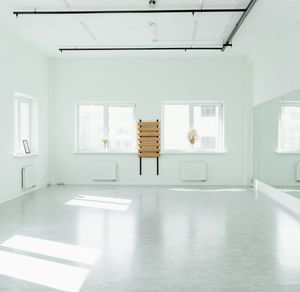 An empty, serene studio space with natural light.
